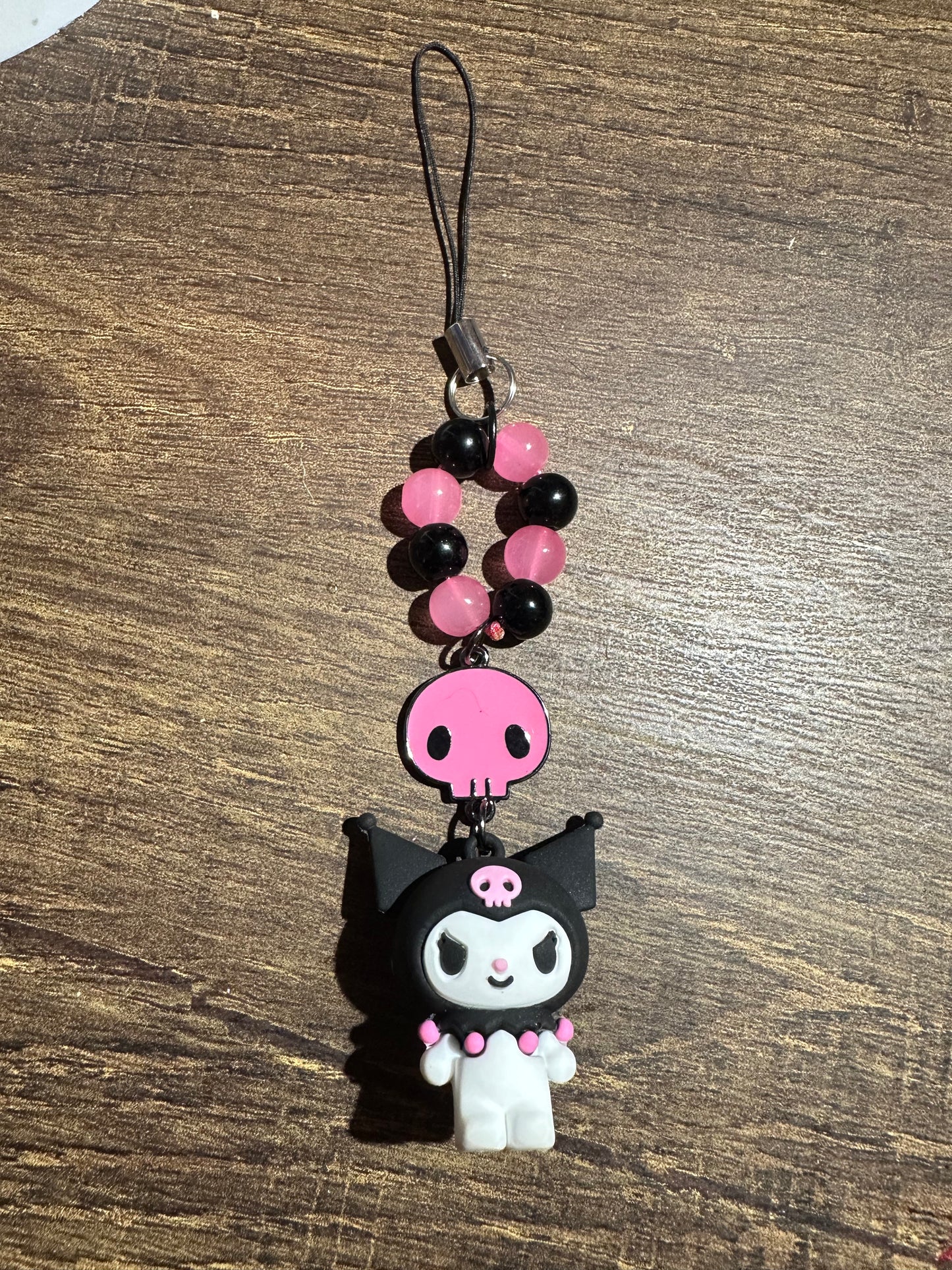Pink skull and buddy phone charm